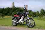 Motorrad GN 250 mit vielen