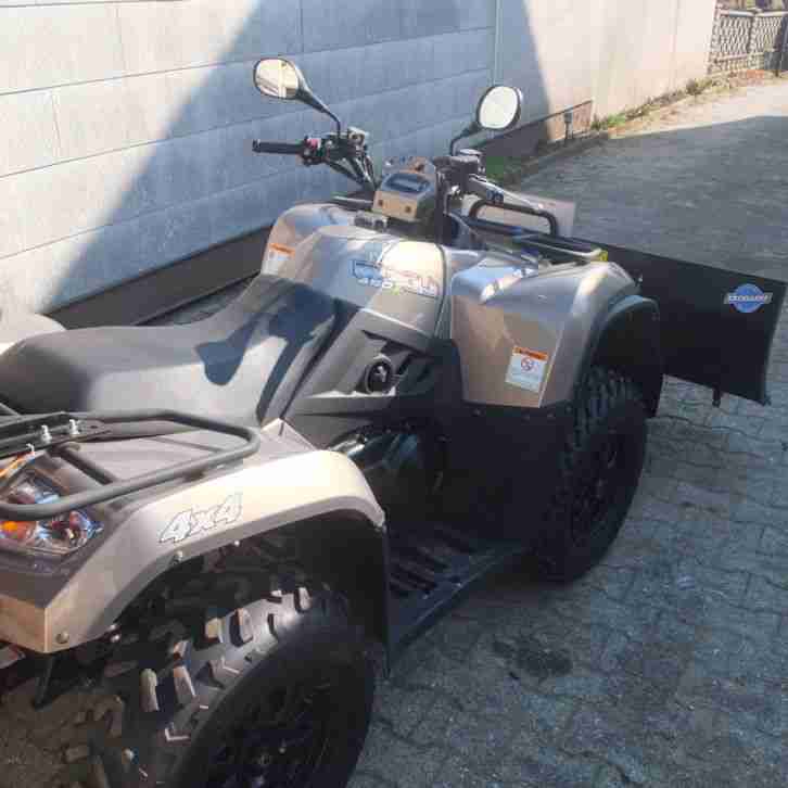 Quad kymco mxu 450i mit Schneeschild und Streuer