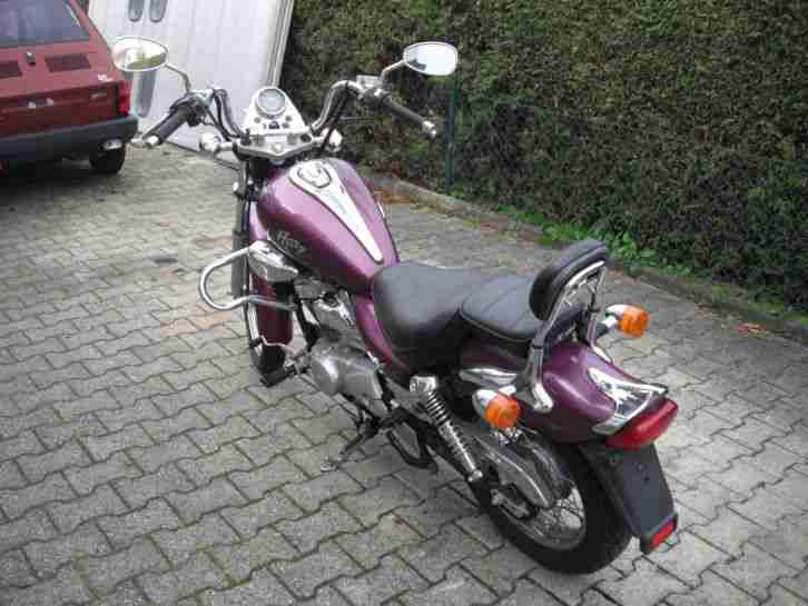 San Yang Husky 125
