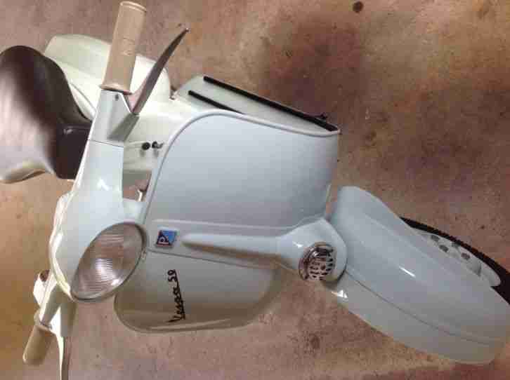 VESPA SPORTELLINO PICCOLO 50N PRIMA SERIE COLORE: VERDE ACQUA MARINA ORIGINALE