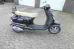 Vespa LX mit 25 Papieren