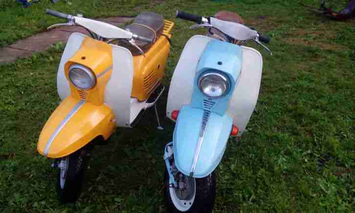 pair of Viatka Elektron Motorräder scooters
